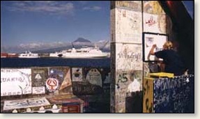 Boats paint their logos on the walls in Faial, Azores