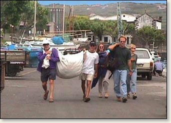 The Valkyrie crew carrying laundry in Faial, Azores