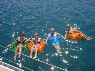 Heidi Diaz, Laura Strentz, Joan Strentz and Tamra Strentz floating off Valkyrie in Paros, Greece